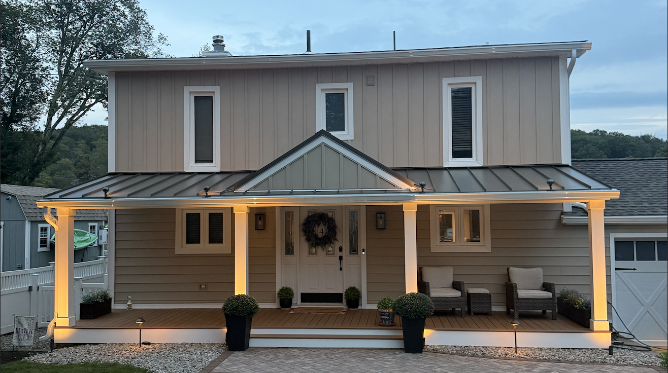 After: CertainTeed CertaPlank Savannah Wicker siding with new framing peak and metal roof in Lake Hopatcong, NJ
