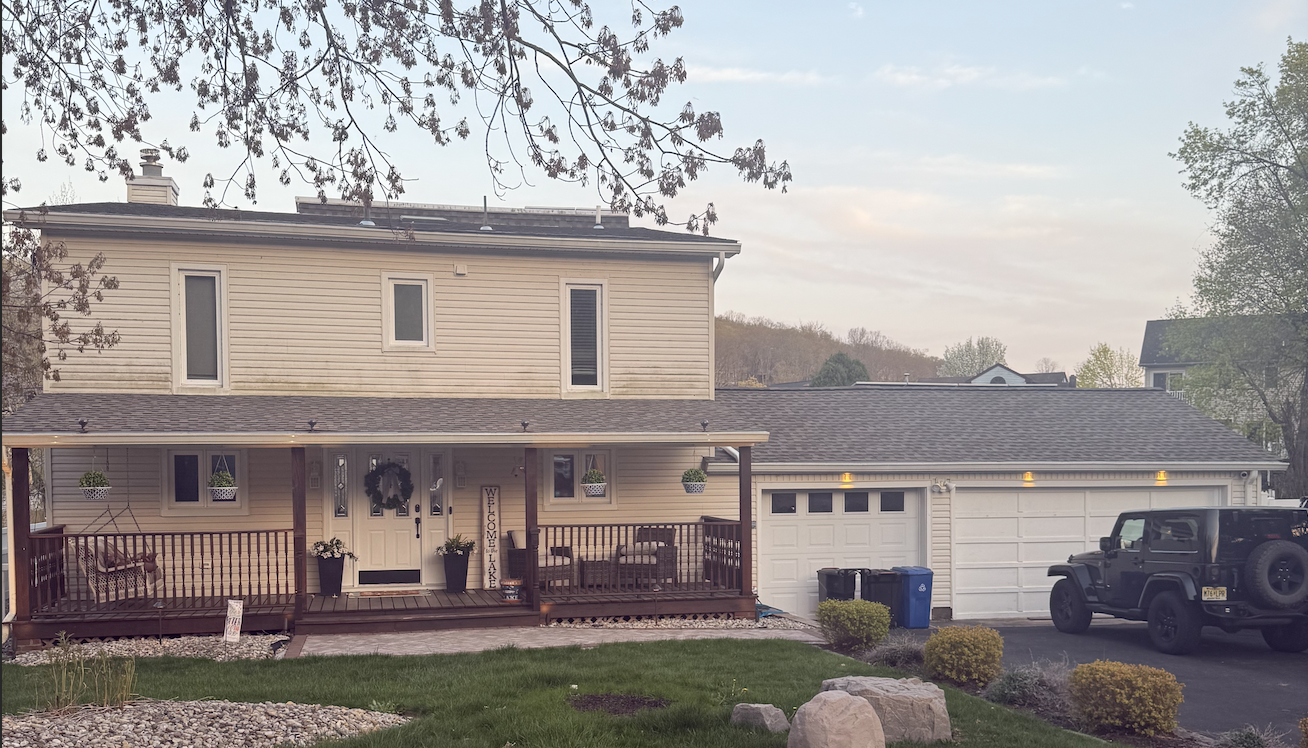 Before: Original siding and porch on lakefront home in Lake Hopatcong, NJ