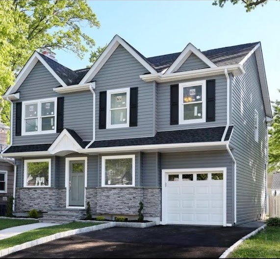 After: completed CertainTeed Flagstone siding and GAF Timberline roof in Rochelle Park, NJ
